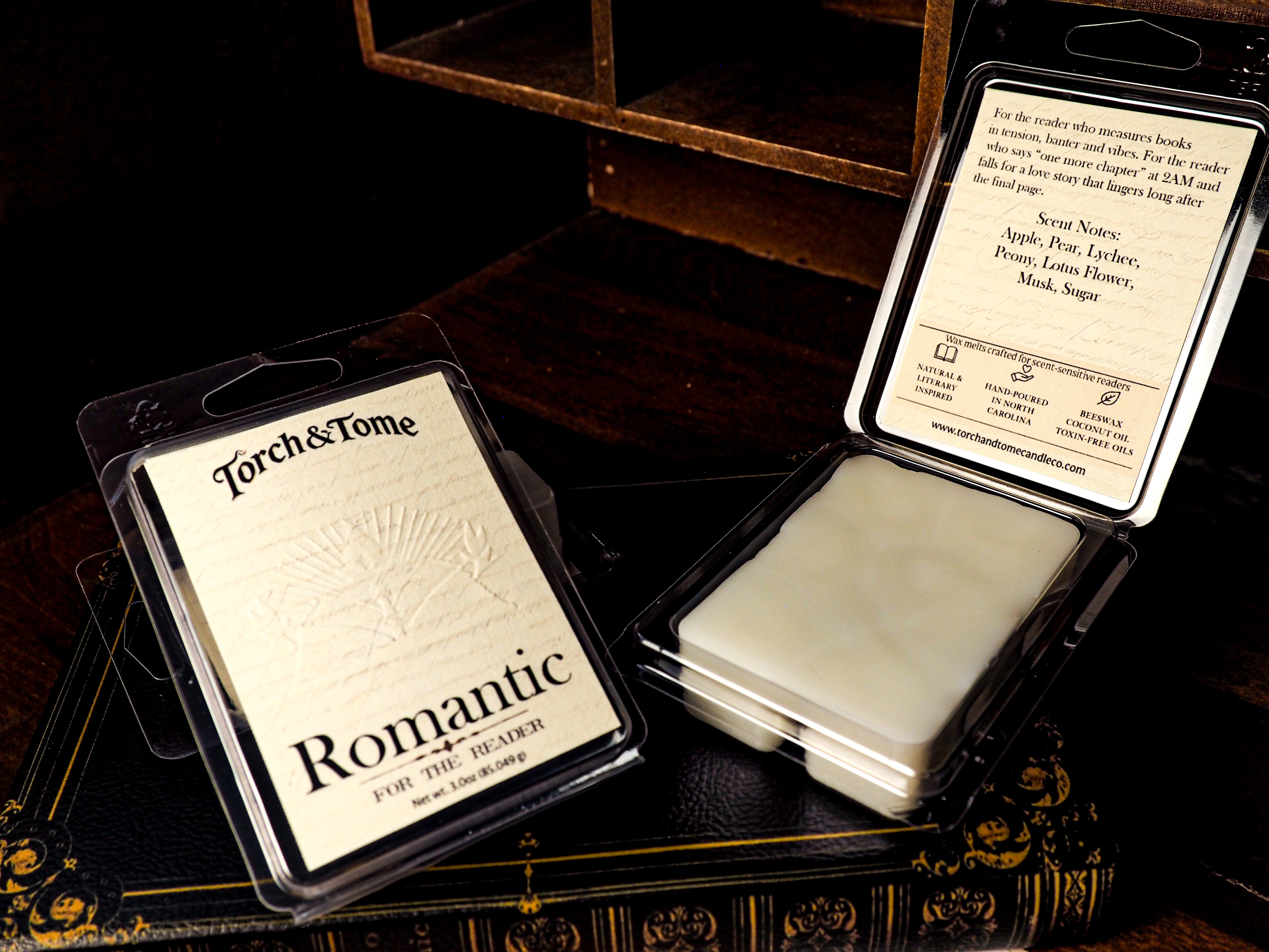 Packaged product with 'Torch & Tome' branding on a dark surface