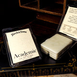 Torch & Tome Academic waxmelts in packaging on a dark surface