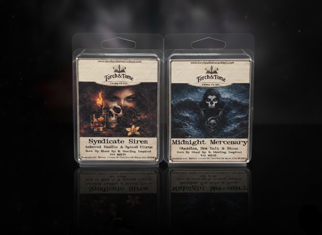Two wax tarts (Syndicate Siren on the left, Midnight Mercenary on the right) in packaging with scent related designs depicted on the label on a dark smoky background