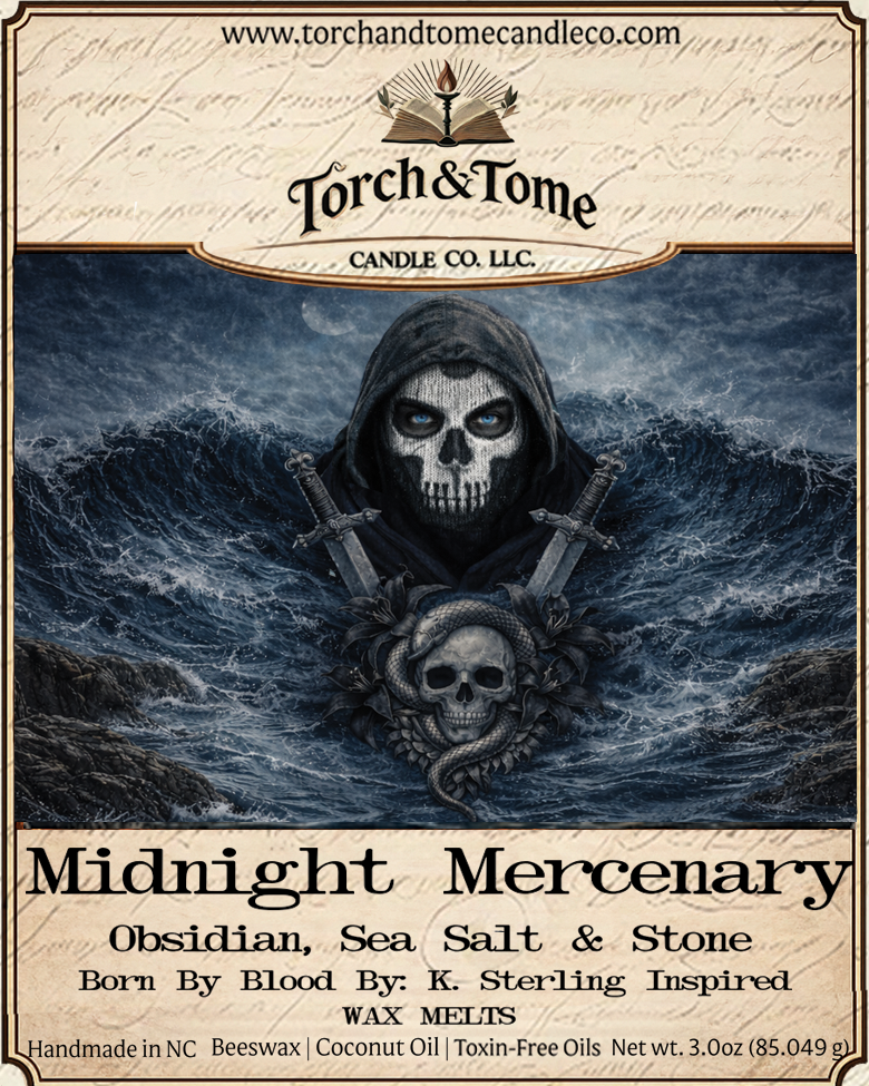 Candle label for 'Midnight Mercenary' by Torch & Tome Candle Co. with a hooded figure and skull design and two frenh swords on the label. Scent notes are obsidian, sea salt and stone.